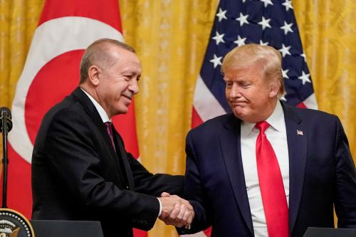 U.S. President Donald Trump greets Turkey's President Tayyip Erdogan during a joint news conference at the White House in Washington, U.S., November 13, 2019. REUTERS/Joshua Roberts - RC2MAD9Q8ACH