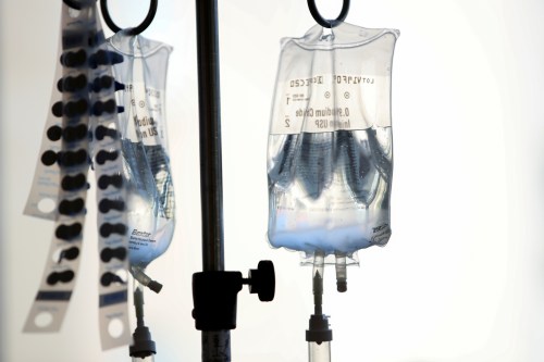 FILE PHOTO: Intravenous bags hang above young cancer patients at Rady's Children Hospital in San Diego, California, U.S., September 4, 2019.      REUTERS/Mike Blake/File Photo - RC2EAD9AFK1N