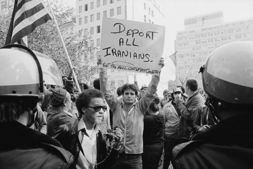 Police stand guard at a demonstration during the Iran hostage crisis, in Washington, D.C., U.S., November 9, 1979.  Library of Congress/Marion S. Trikosko/Handout via REUTERS   ATTENTION EDITORS - THIS IMAGE WAS PROVIDED BY A THIRD PARTY. - RC1573866350