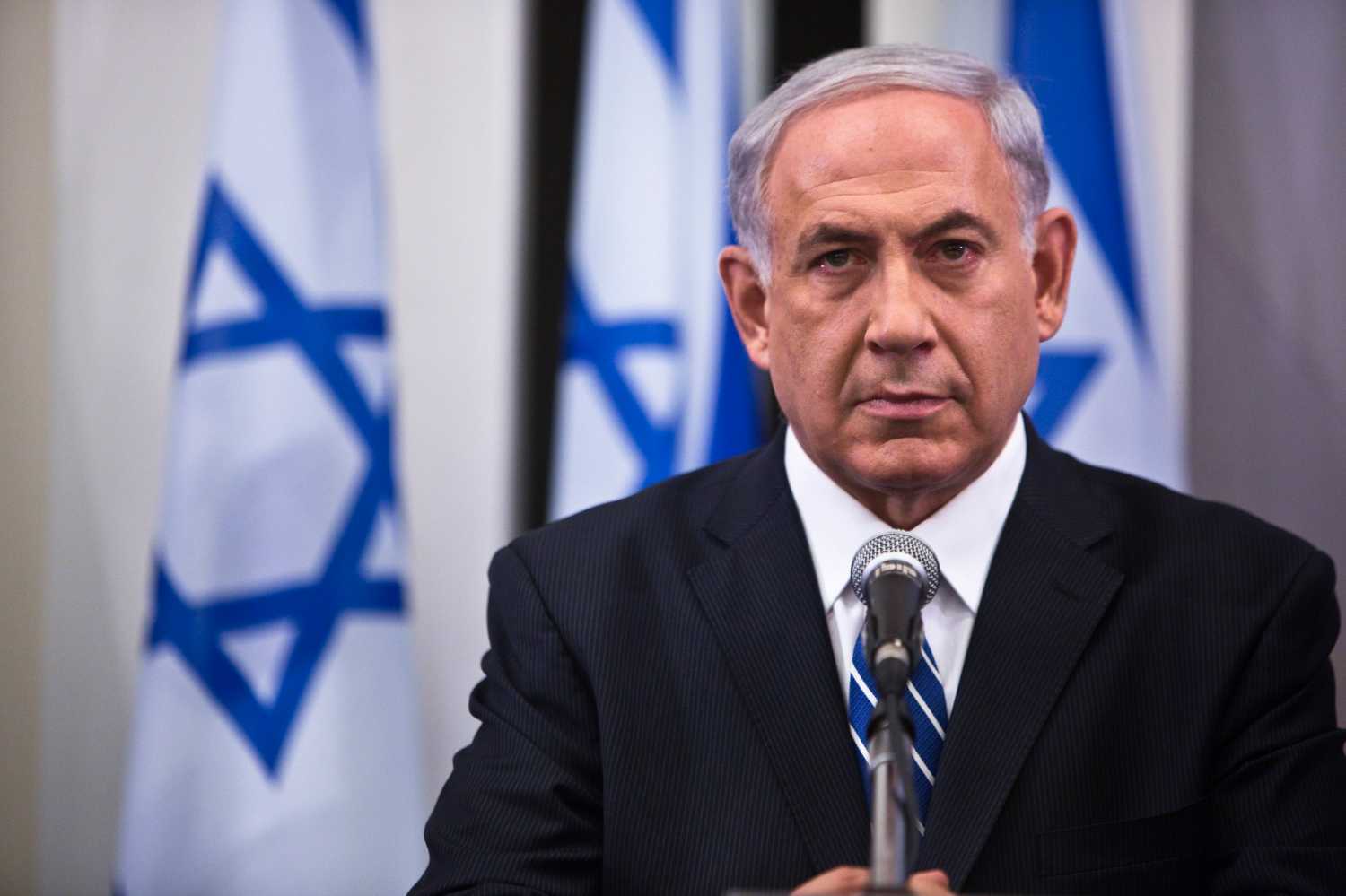 Israel's Prime Minister Benjamin Netanyahu reacts after delivering a statement  during a news conference in Tel Aviv June 14, 2014. Israel sent more troops to the occupied West Bank on Saturday to step up searches for three Israeli teenagers believed to have been abducted by Palestinians, with a military source saying it was not known if they were dead or alive. In a televised statement delivered after he conferred with his security chiefs, Netanyahu said the three teenagers had "definitely" been kidnapped - though he did not say by whom. REUTERS/Nir Elias (ISRAEL - Tags: POLITICS MILITARY HEADSHOT TPX IMAGES OF THE DAY) - GM1EA6F0BBK01