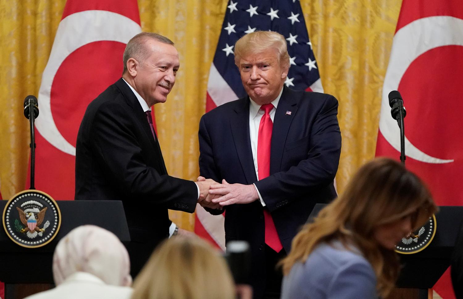 U.S. President Donald Trump and Turkey's President Tayyip Erdogan shake hands at the end of a joint news conference at the White House in Washington, U.S., November 13, 2019. REUTERS/Joshua Roberts - RC2LAD9PASW2