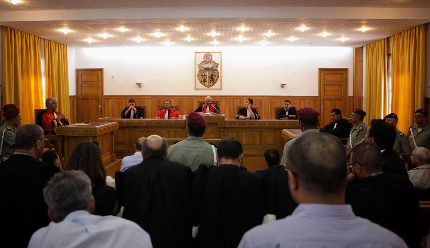 A general view of the trial is seen at a military court in Tunis July 19, 2012. Former Interior Minister Rafik Belhaj Kacem was sentenced to 15 years in jail and Ben Ali's security chief Ali Seriati was given 20 years over the killing of protesters in the capital Tunis and the towns of Sousse, Nabeul, Bizerte and Zaghouan as a popular uprising spread through the country early last year. Ben Ali fled with his family to Saudi Arabia. REUTERS/Zoubeir Souissi (TUNISIA - Tags: POLITICS CRIME LAW) - GM1E87J1QML01