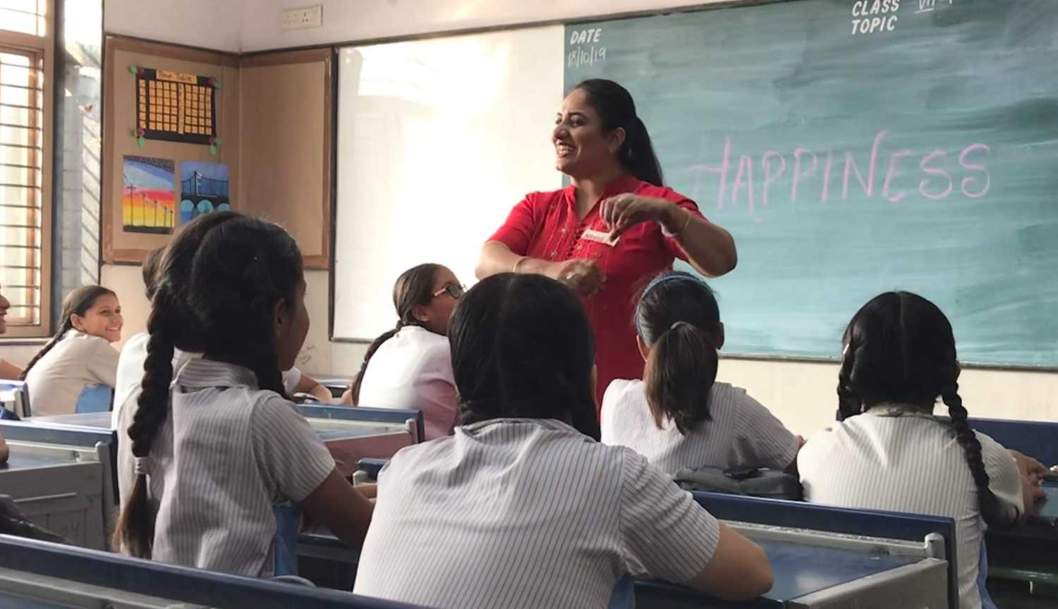 Woman teaches happiness class