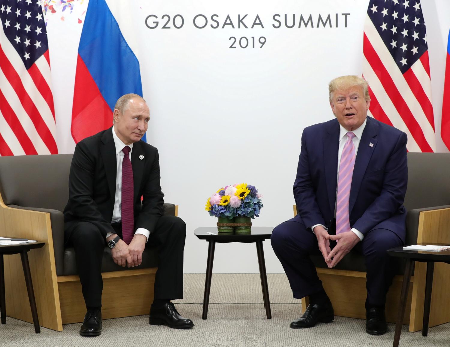 Russia's President Vladimir Putin and U.S. President Donald Trump attend a meeting on the sidelines of the G20 summit in Osaka, Japan June 28, 2019. Sputnik/Mikhail Klimentyev/Kremlin via REUTERS  ATTENTION EDITORS - THIS IMAGE WAS PROVIDED BY A THIRD PARTY. - RC12E21409F0