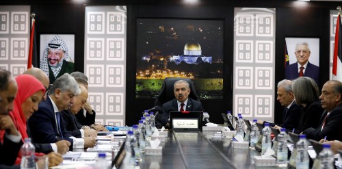 Palestinian Prime Minister Mohammad Shtayyeh speaks during a cabinet meeting of the new Palestinian government, in Ramallah, in the Israeli-occupied West Bank April 15, 2019. REUTERS/Mohamad Torokman - RC18BBEC7170