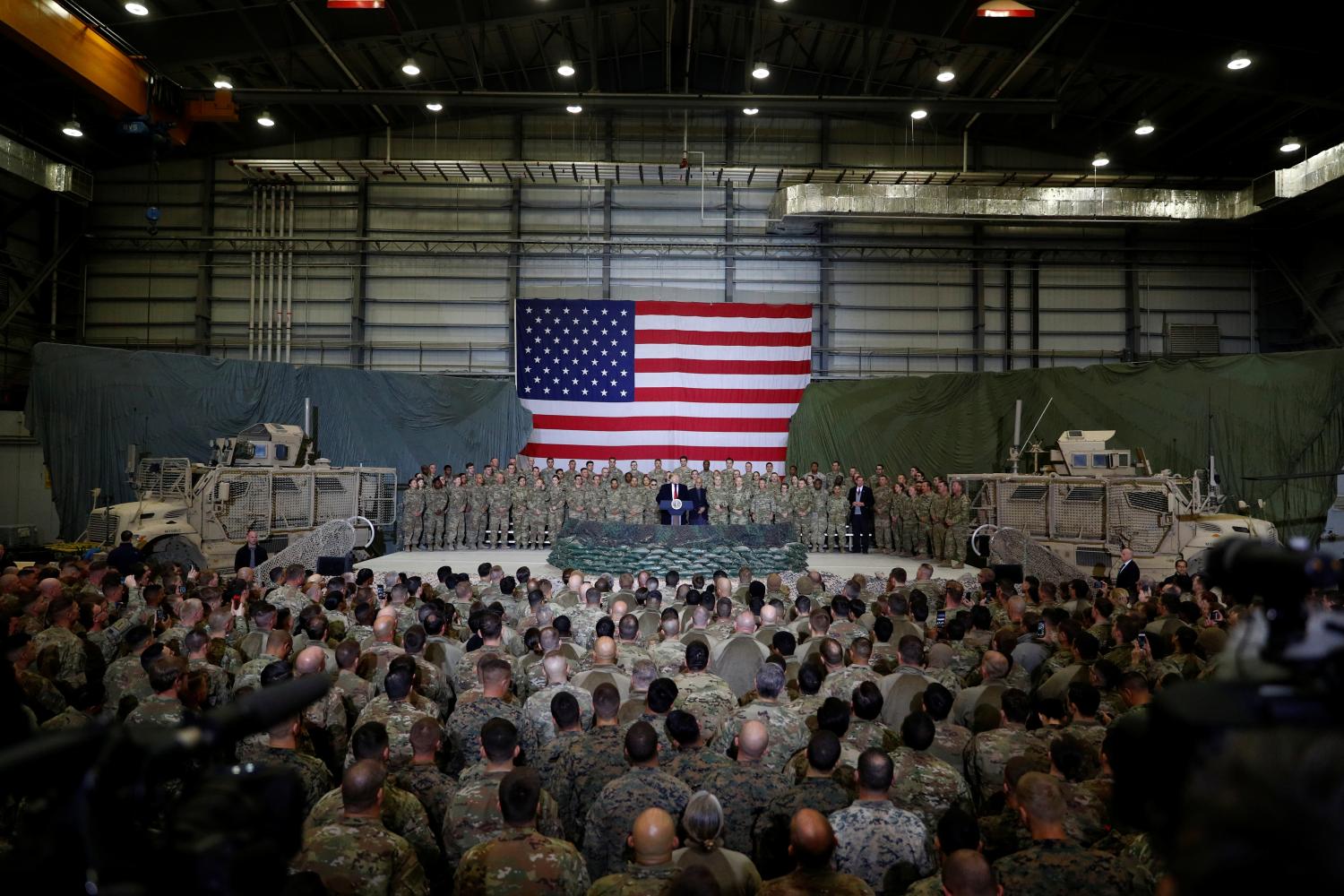 U.S. President Donald Trump delivers remarks to U.S. troops during an unannounced visit to Bagram Air Base, Afghanistan, November 28, 2019. REUTERS/Tom Brenner - RC2JKD9WFP81