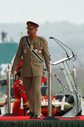 Pakistan's Army Chief of Staff General Qamar Javed Bajwa, walks as he arrives to attend the Pakistan Day military parade in Islamabad, Pakistan March 23, 2019. Picture taken March 23, 2019. REUTERS/Akhtar Soomro - RC1250AFD490