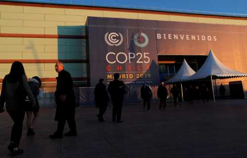 Participants enter the U.N. climate change conference (COP25) in Madrid, Spain, December 3, 2019. REUTERS/Susana Vera - RC2KND93G2RP