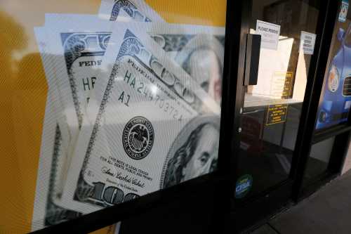 The storefront of an Advance America loan store is shown in Palm Springs, California, U.S. June 2, 2016.  REUTERS/Sam Mircovich - S1AETHPRMZAB