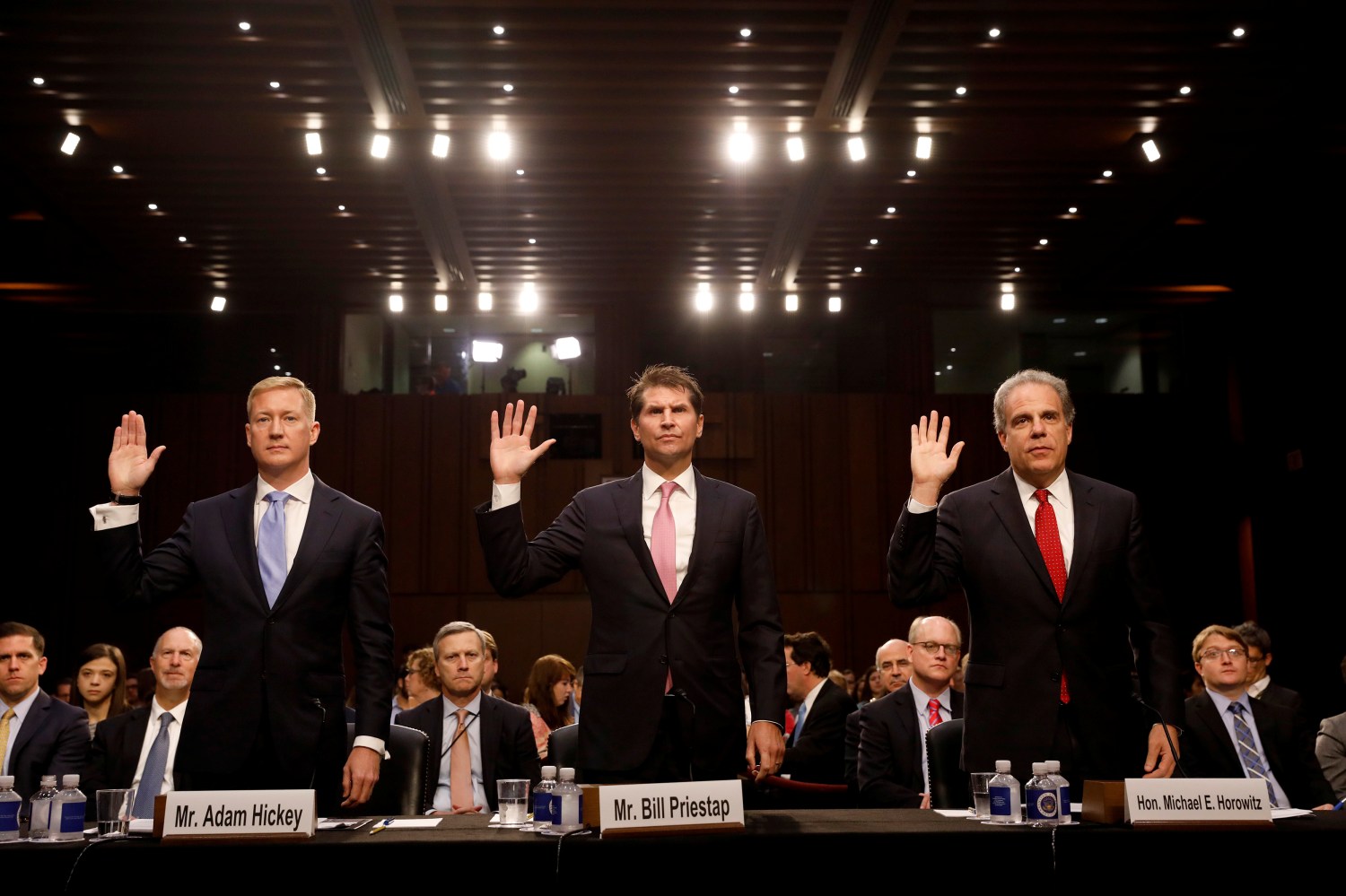 Deputy Assistant Attorney General Adam Hickey, Bill Priestap, assistant director of the FBI's Counterintelligence Division, and Justice Department Inspector General Michael Horowitz are sworn in during a Judiciary Committee hearing into alleged Russian meddling in the 2016 election on Capitol Hill in Washington, U.S., July 26, 2017. REUTERS/Aaron P. Bernstein - RC14DA9ED4D0