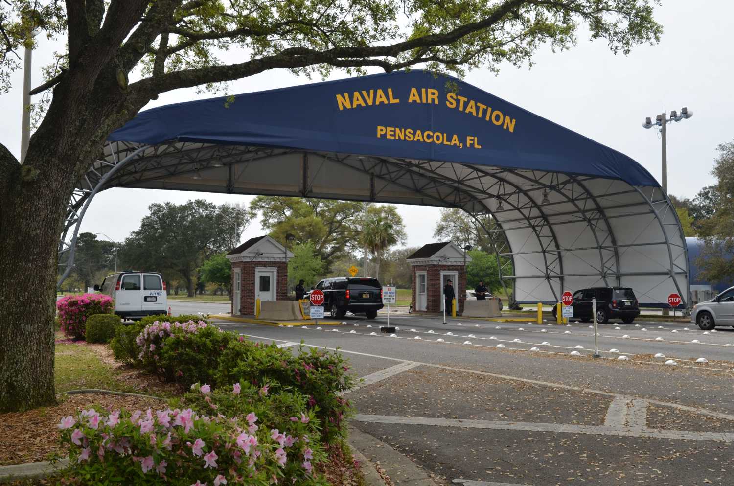 The main gate at Naval Air Station Pensacola is seen on Navy Boulevard in Pensacola, Florida, U.S. March 16, 2016. Picture taken March 16, 2016.  U.S. Navy/Patrick Nichols/Handout via REUTERS.  THIS IMAGE HAS BEEN SUPPLIED BY A THIRD PARTY. - RC2RPD9BC4N8