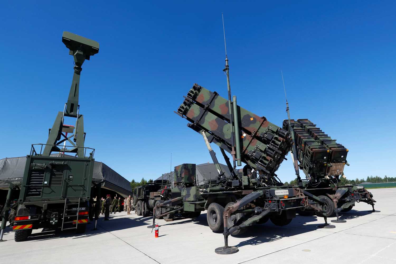 U.S. long range air defence systems Patriot (R) and British radar Giraffe AMB are displayed during Toburq Legacy 2017 air defence exercise in the military airfield near Siauliai, Lithuania, July 20, 2017. REUTERS/Ints Kalnins - RC1B20807F00
