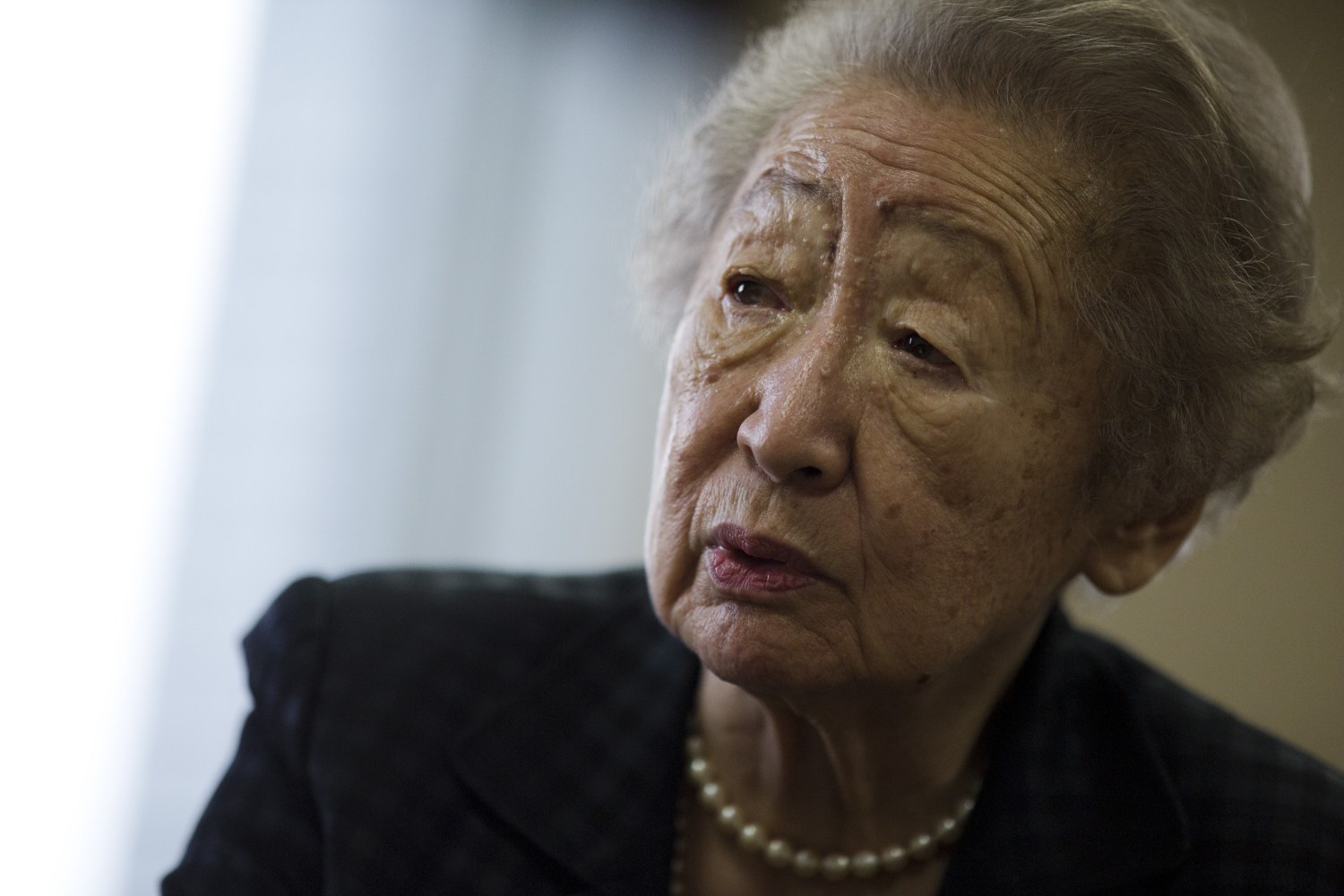 Sadako Ogata, former U.N. High Commissioner for Refugees, speaks during an interview in Tokyo, October 29, 2015. Japan, which accepted less than a dozen asylum seekers last year, should show more leadership on refugees and craft an immigration policy given its need for foreign workers, the former U.N. High Commissioner for Refugees said on Thursday. Ogata, 88, whose great-grandfather, then-premier Tsuyoshi Inukai, was assassinated by radical naval officers in 1932, also said that while Japan's military had a global role to play, it should not be one that involved fighting overseas.  REUTERS/Thomas Peter - GF20000037482