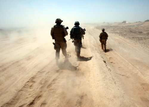 U.S. Marines walk around a base in Helmand province, southern Afghanistan, September 3, 2009.REUTERS/Goran Tomasevic (AFGHANISTAN CONFLICT POLITICS IMAGES OF THE DAY) - GM1E593173U01