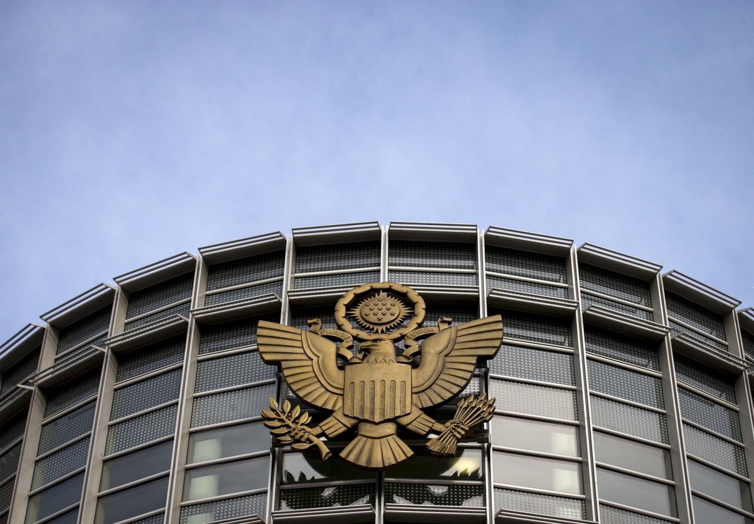 The Seal of the United States of America is seen on the Brooklyn Federal Courthouse in the Brooklyn borough in New York April 2, 2015. Two New York City women have been arrested in an alleged conspiracy to build a bomb and wage a "terrorist attack" in the United States, according to a federal criminal complaint made public on Thursday. Noelle Velentzas, 28, and Asia Siddiqui, 31, devised a plot to target police, government or military targets based on their "violent jihadist beliefs," according to the complaint filed in U.S. District Court in Brooklyn. REUTERS/Brendan McDermid