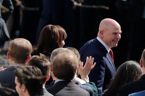Staff gather as outgoing National Security Adviser H.R. McMaster walks out of the White House during his last day on the job in Washington, D.C., U.S. April 6, 2018. REUTERS/Carlos Barria