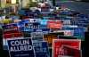 Campaign signs are seen outside a polling station on the last day of early voting in Dallas, Texas, U.S., November 2, 2018. REUTERS/Mike Segar