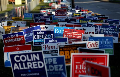 Campaign signs are seen outside a polling station on the last day of early voting in Dallas, Texas, U.S., November 2, 2018. REUTERS/Mike Segar
