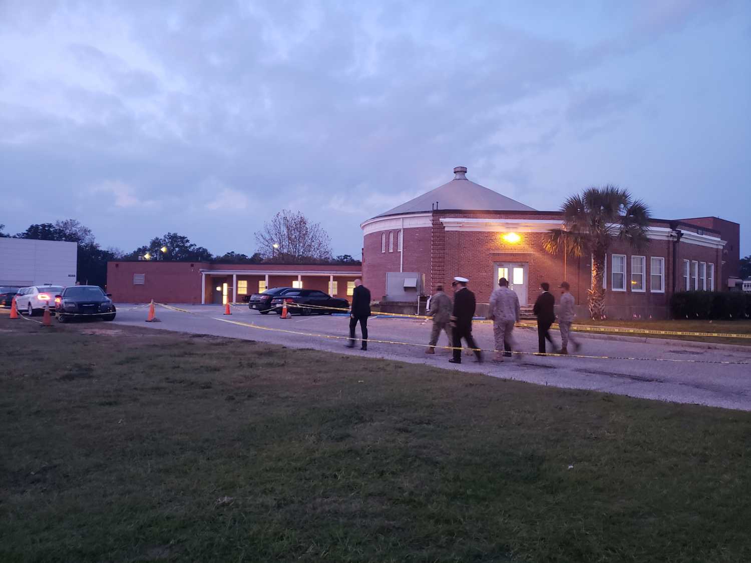 Saudi Arabia Defense Attache Major General Fawaz Al Fawaz and his Embassy staff and other officials arrive to meet with the Saudi students who remain restricted to the Naval Air Station (NAS) Pensacola base by their Saudi commanding officer, in Pensacola, Florida, U.S. December 9, 2019. Picture taken December 9, 2019.  FBI Jacksonville/Handout via REUTERS  THIS IMAGE HAS BEEN SUPPLIED BY A THIRD PARTY. - RC2ISD9IDSIC