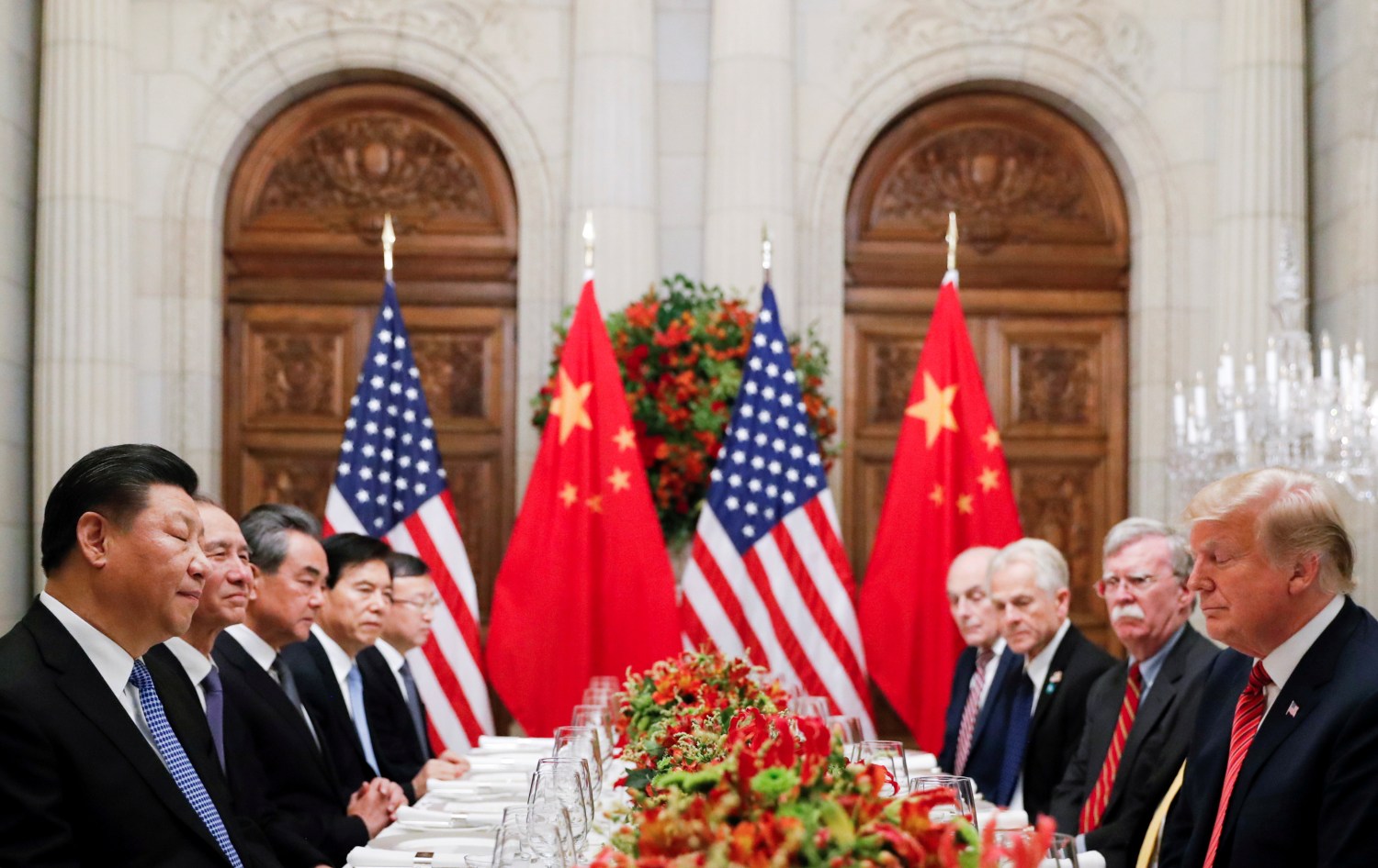 FILE PHOTO: U.S. President Donald Trump, U.S. Secretary of State Mike Pompeo, U.S. President Donald Trump's national security adviser John Bolton and Chinese President Xi Jinping attend a working dinner after the G20 leaders summit in Buenos Aires, Argentina December 1, 2018. REUTERS/Kevin Lamarque - RC142DD2AE40/File Photo
