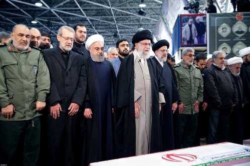 FILE PHOTO: Iran's Supreme Leader Ayatollah Ali Khamenei and Iranian President Hassan Rouhani pray near the coffin of Iranian Major-General Qassem Soleimani, head of the elite Quds Force, who was killed in an air strike at Baghdad airport, in Tehran, Iran, January 6, 2020. Official President's website/Handout via REUTERS ATTENTION EDITORS - THIS IMAGE WAS PROVIDED BY A THIRD PARTY. NO RESALES. NO ARCHIVES/File Photo