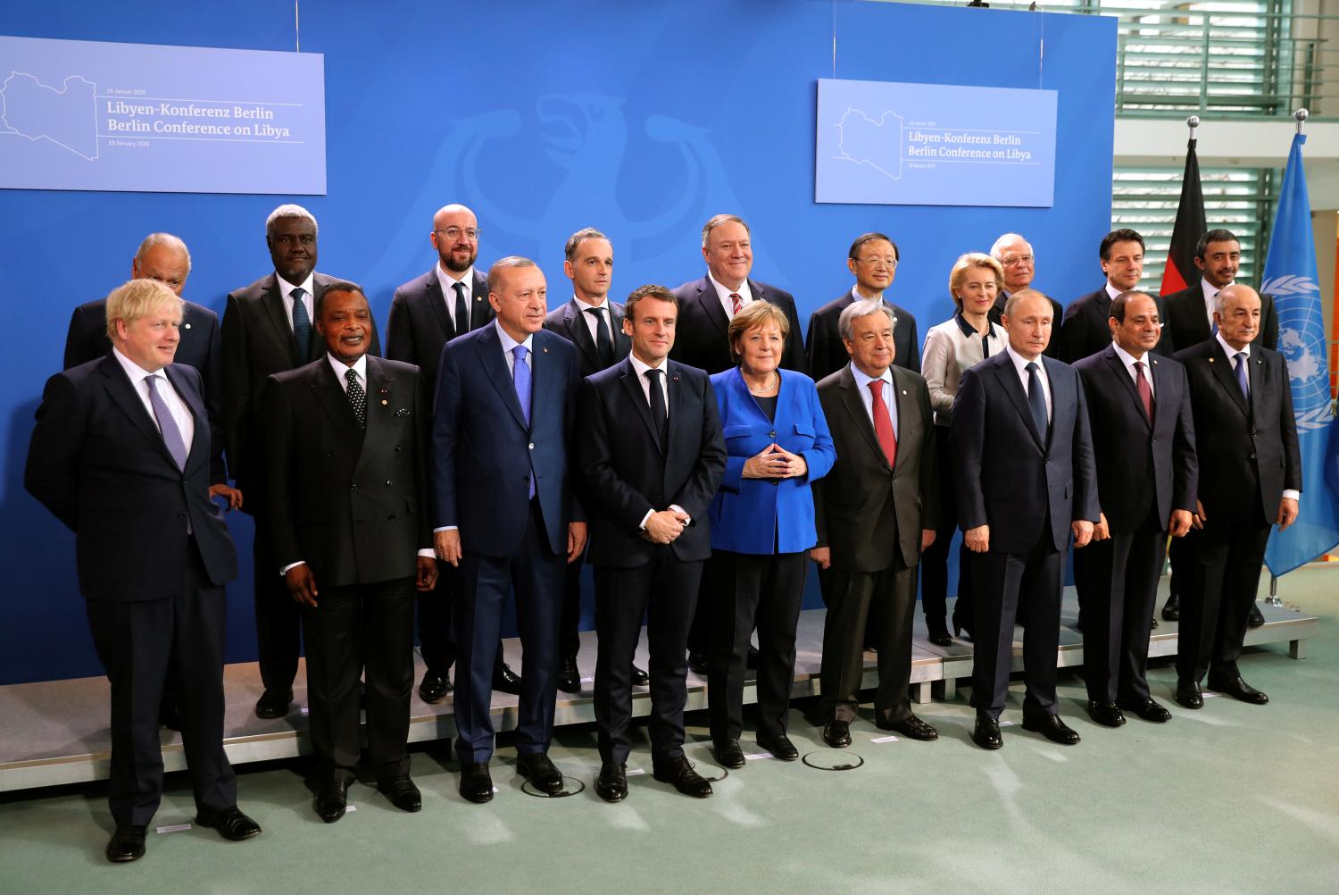 Britain's Prime Minister Boris Johnson, Republic of Congo's President Denis Sassou Nguesso, Turkish President Recep Tayyip Erdogan, French President Emmanuel Macron, German Chancellor Angela Merkel, United Nations Secretary-General Antonio Guterres, Russian President Vladimir Putin, Egyptian President Abdel Fattah al-Sisi, Algerian President Abdelmadjid Tebboune, U.S. Secretary of State Mike Pompeo and European Commission President Ursula von der Leyen pose for a family photo during the Libya summit in Berlin, Germany, January 19, 2020. Murat Cetinmuhurdar/Turkish Presidential Press Office/Handout via REUTERS ATTENTION EDITORS - THIS PICTURE WAS PROVIDED BY A THIRD PARTY. NO RESALES. NO ARCHIVE