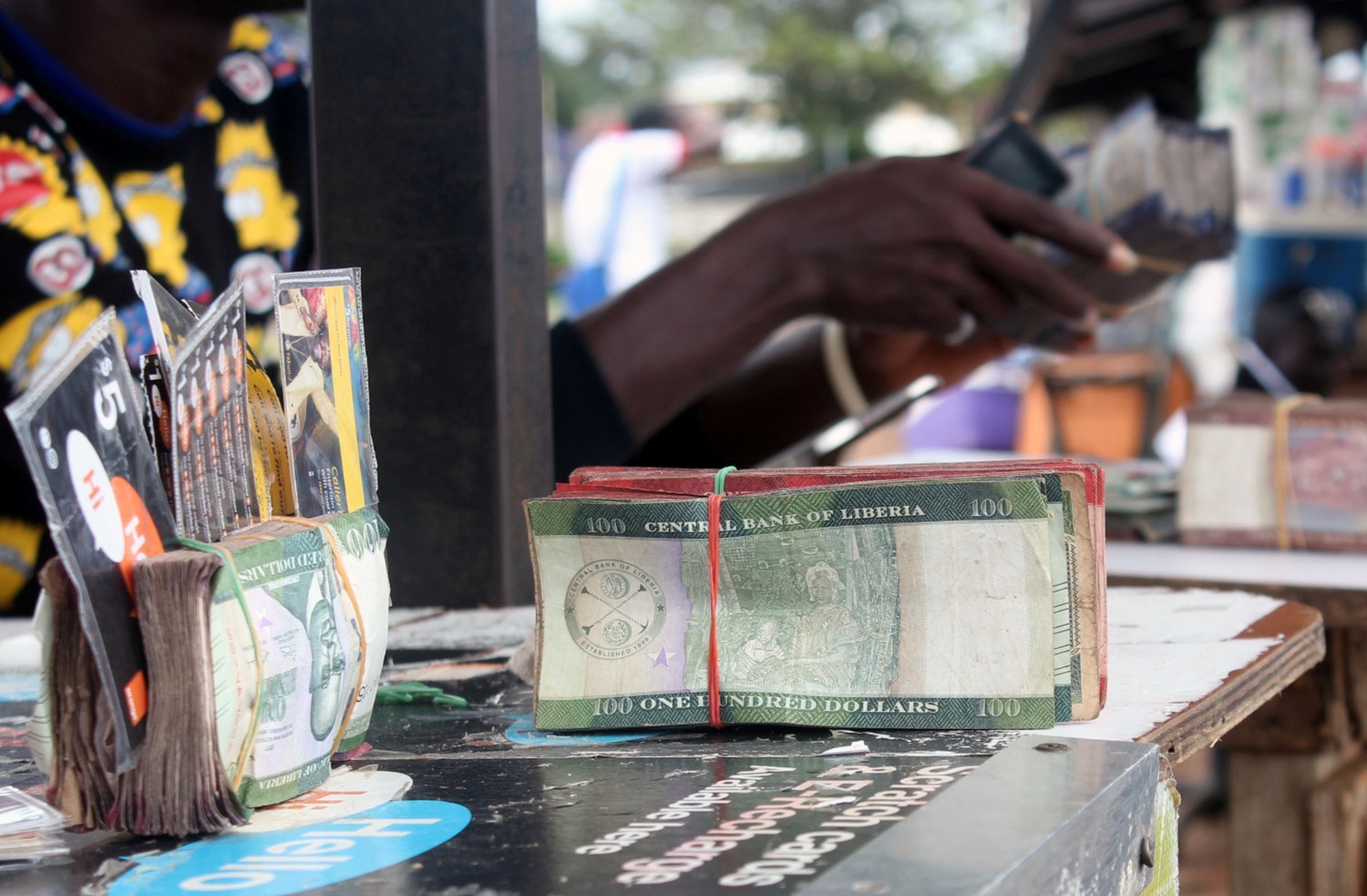 Liberian banknotes are pictured at a money changer's stand in Monrovia, Liberia September 21, 2018. REUTERS/Derick Snyder