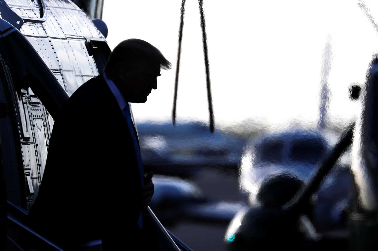 U.S. President Donald Trump descends from Marine One at Miami Executive Airport in Miami, Florida ahead of an evangelical speaking event, January 3, 2020. REUTERS/Tom Brenner - RC2M8E95VCIS
