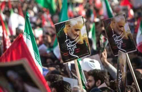 TEHRAN, IRAN.- People hold posters during the funeral ceremony of Iranian general Qassem Soleimani in Tehran, Iran, Jan. 6, 2020. Hundreds of thousands of Iranians in Tehran on Monday mourned the assassination of Qassem Soleimani.
