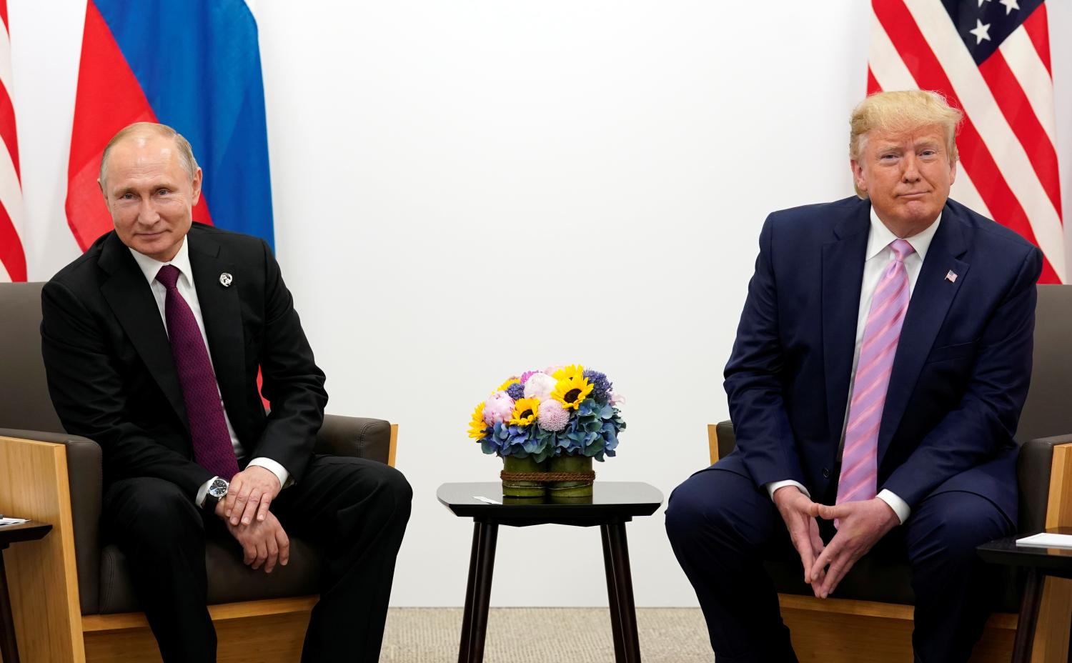 U.S. President Donald Trump meets with Russian President Vladimir Putin at the G20 Summit in Osaka, Japan June 28, 2019.  REUTERS/Kevin Lamarque - RC1455EA2DC0