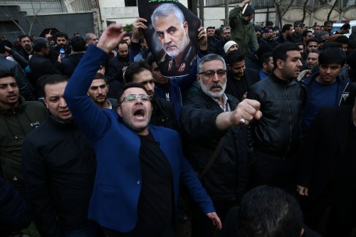 Iranian demonstrators react during a protest against the assassination of the Iranian Major-General Qassem Soleimani, head of the elite Quds Force, and Iraqi militia commander Abu Mahdi al-Muhandis, who were killed in an air strike at Baghdad airport, in front of United Nation office in Tehran, Iran January 3, 2020. Nazanin Tabatabaee/WANA (West Asia News Agency) via REUTERS ATTENTION EDITORS - THIS IMAGE HAS BEEN SUPPLIED BY A THIRD PARTY.