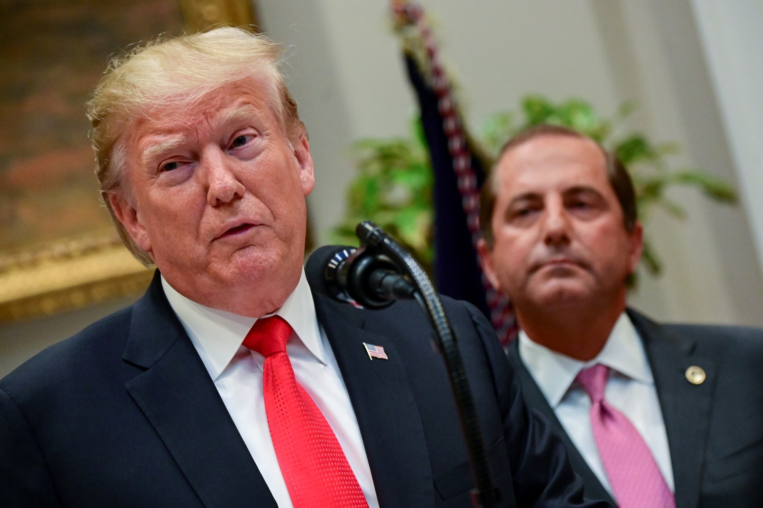 U.S. President Donald Trump, joined by Health and Human Services Secretary Alex Azar, announces opioid response grants to state governments in the Roosevelt Room of the White House in Washington, U.S. September 4, 2019. REUTERS/Erin Scott