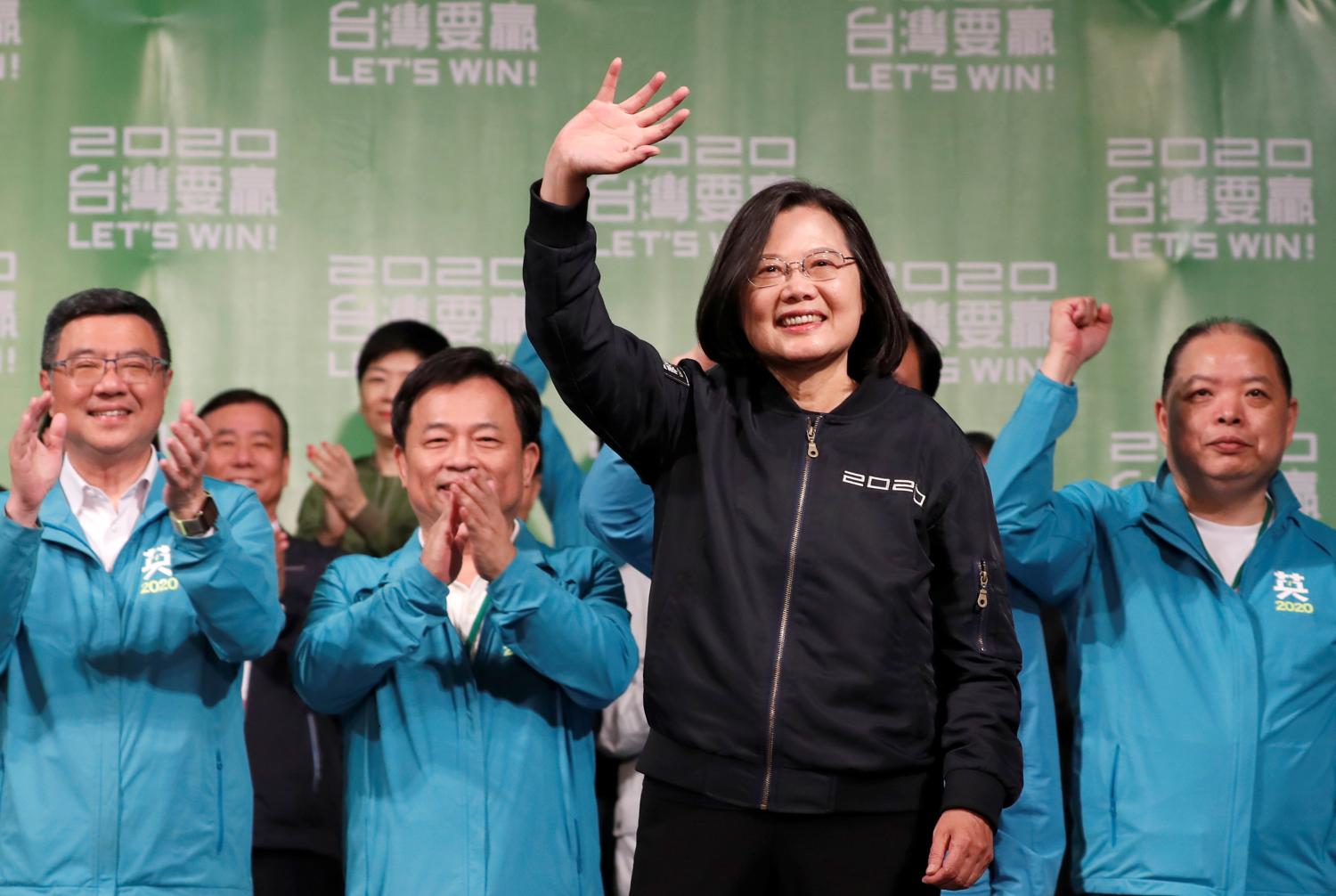 Incumbent Taiwan President Tsai Ing-wen waves to her supporters after her election victory at a rally, outside the Democratic Progressive Party (DPP) headquarters in Taipei, Taiwan January 11, 2020. REUTERS/Tyrone Siu