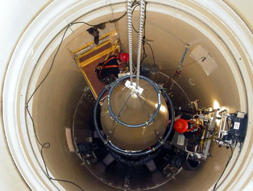 A US Air Force missile maintenance team removes the upper section of an intercontinental ballistic missile with a nuclear warhead in an undated USAF photo at Malmstrom Air Force Base, Montana. Reviews of the U.S. nuclear arsenal show significant changes are needed to ensure the security and effectiveness of the force, a Defense Department report said November 14, 2014.  REUTERS/USAF/Airman John Parie/handout via Reuters (UNITED STATES - Tags: MILITARY POLITICS) FOR EDITORIAL USE ONLY. NOT FOR SALE FOR MARKETING OR ADVERTISING CAMPAIGNS. THIS IMAGE HAS BEEN SUPPLIED BY A THIRD PARTY. IT IS DISTRIBUTED, EXACTLY AS RECEIVED BY REUTERS, AS A SERVICE TO CLIENTS