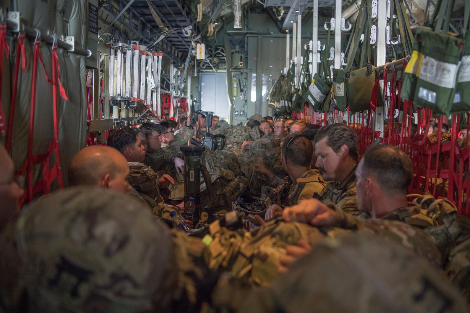 U.S. Army soldiers, assigned to the East Africa Response Force (EARF), 101st Airborne Division await takeoff on a mission to bolster the security of Manda Bay Airfield, Kenya after an attack by Somalia's al Shabaab militants that killed three Americans, are seen aboard a transport plane in Camp Lemonnier, Djibouti January 5, 2020. Picture taken January 5, 2020.  U.S. Air Force/Senior Airman Daniel Hernandez/Handout via REUTERS.  THIS IMAGE HAS BEEN SUPPLIED BY A THIRD PARTY.