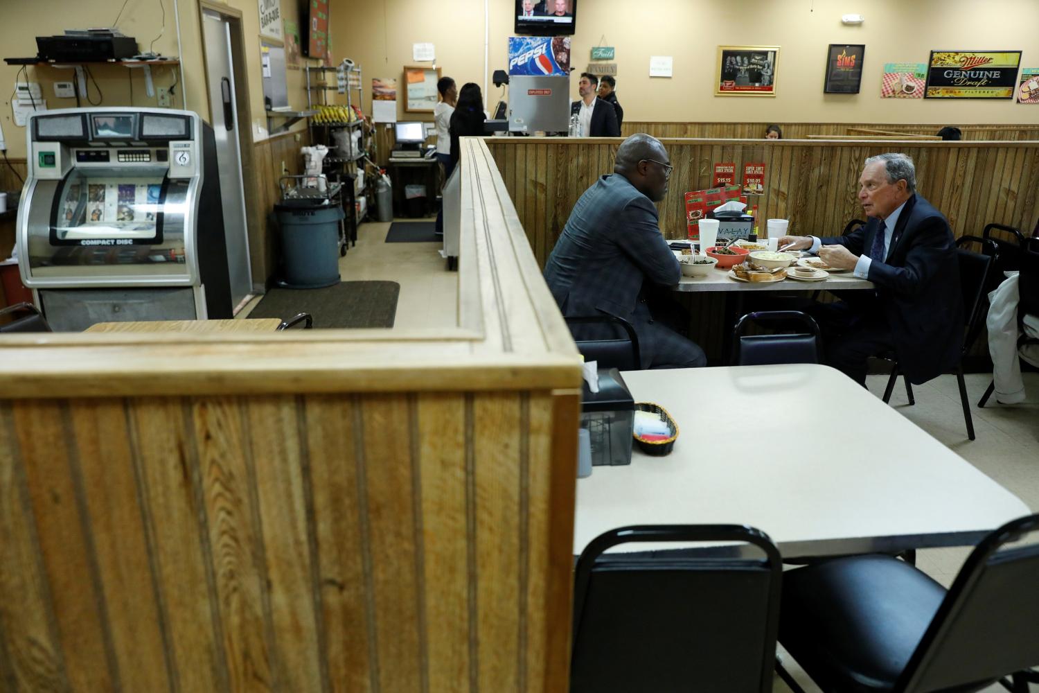 Michael Bloomberg, the billionaire media mogul and former New York City mayor, eats lunch with Little Rock Mayor Frank Scott, Jr. after adding his name to the Democratic primary ballot in Arkansas in Little Rock, Arkansas, U.S., November 12, 2019.  REUTERS/Chris Aluka Berry