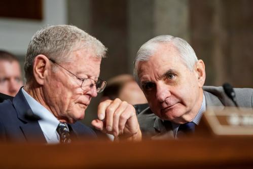 Chairman of the Senate Armed Services Committee James Inhofe (R-OK) speaks with Senator Jack Reed (D-RI) during a hearing examining military housing on Capitol Hill in Washington, U.S., December 3, 2019.      REUTERS/Joshua Roberts