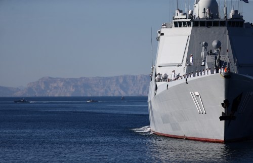Warships sail in the Sea of Oman during the first day of joint Iran, Russia and China naval war games in Chabahar port, at the Sea of Oman, Iran, December 27, 2019. Picture taken December 27, 2019. Mohsen Ataei/Fars news agency/WANA (West Asia News Agency) via REUTERS ATTENTION EDITORS - THIS IMAGE HAS BEEN SUPPLIED BY A THIRD PARTY