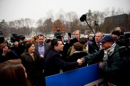 Pete Buttigieg, Democratic presidential candidate and former South Bend, Indiana mayor greets a supporter as he drops by a polling location on primary day in Nashua, New Hampshire, U.S., February 11, 2020. REUTERS/Eric Thayer