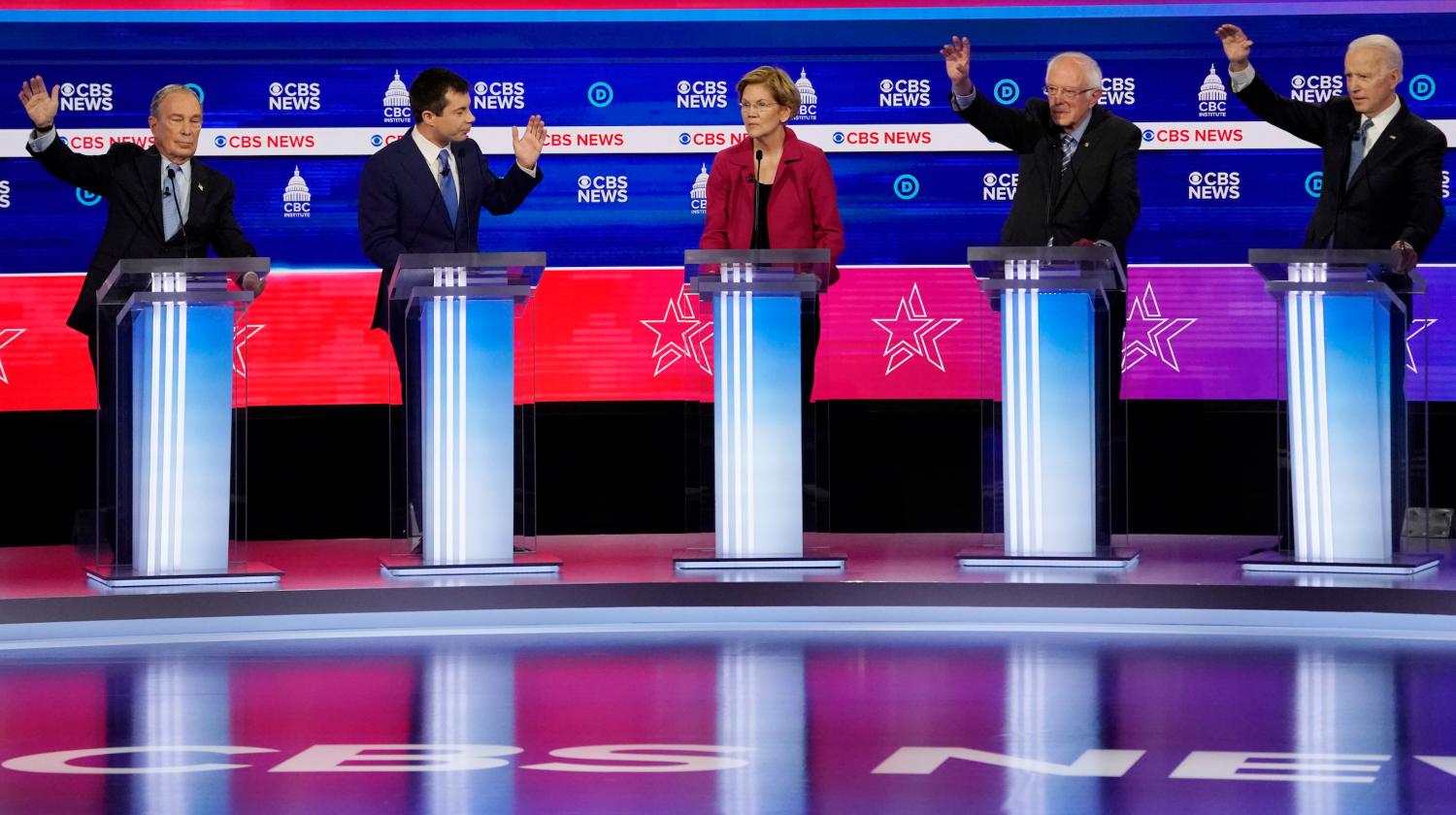 Democratic 2020 U.S. presidential candidates former New York Mayor Mike Bloomberg, former South Bend Mayor Pete Buttigieg, Senator Elizabeth Warren, Senator Bernie Sanders and former Vice President Joe Biden discuss an issue during the tenth Democratic 2020 presidential debate at the Gaillard Center in Charleston, South Carolina, U.S., February 25, 2020. REUTERS/Jonathan Ernst