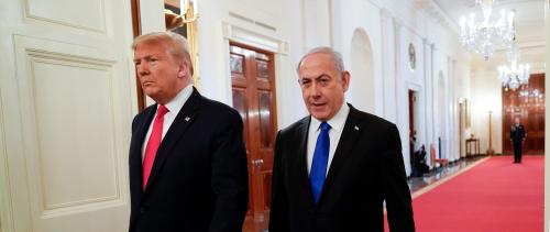 U.S. President Donald Trump and Israel's Prime Minister Benjamin Netanyahu arrive at a joint news conference to discuss a new Middle East peace plan proposal in the East Room of the White House in Washington, U.S., January 28, 2020. REUTERS/Joshua Roberts - RC26PE96WRCW