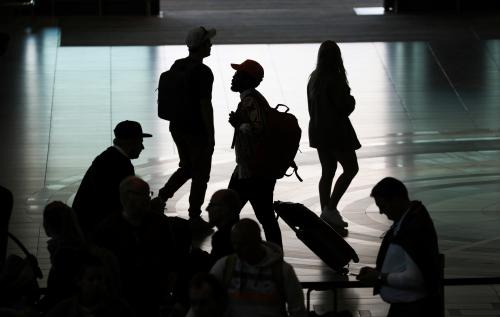 Passengers walk through an airport, as workers of  South African Airways (SAA) downed tools on Friday in a strike over wages and job cuts, at Cape Town International Airport in Cape Town, South Africa, South Africa, November 15, 2019. REUTERS/Sumaya Hisham