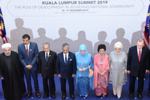 Iranian President Hassan Rouhani, Qatar's Emir Sheikh Tamim bin Hamad Al Thani, Malaysia's Prime Minister Mahathir Mohamad, Malaysia's King Sultan Abdullah Sultan Ahmad Shah, Malaysia's Queen Tunku Azizah Aminah Maimunah Iskandariah, Malaysia's First Lady Siti Hasmah Mohamad Ali, Turkey's First Lady Emine Erdogan and Turkey's President Recep Tayyip Erdogan pose for a photograph during Kuala Lumpur Summit in Kuala Lumpur, Malaysia December 19, 2019. Malaysia Department of Information/Handout via REUTERS ATTENTION EDITORS - THIS IMAGE WAS PROVIDED BY A THIRD PARTY. MANDATORY CREDIT. NO RESALES. NO ARCHIVES.
