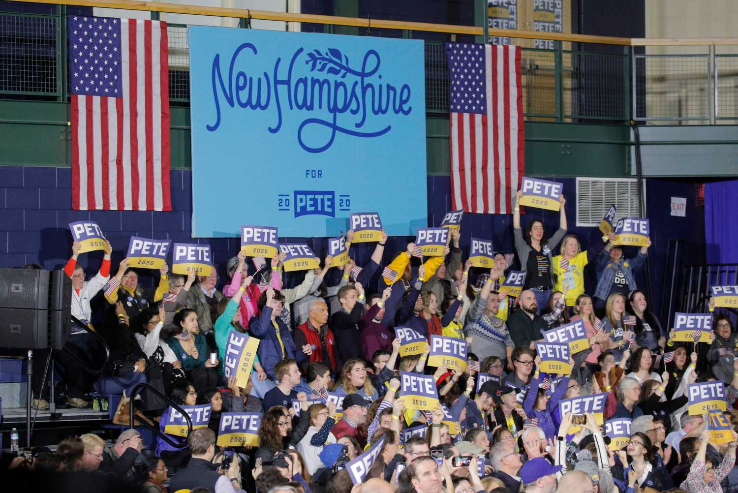 Supporters of Democratic U.S. presidential candidate former South Bend Mayor Pete Buttigieg watch election returns at his New Hampshire primary night rally in Nashua, New Hampshire, U.S., February 11, 2020. REUTERS/Brendan Mcdermid