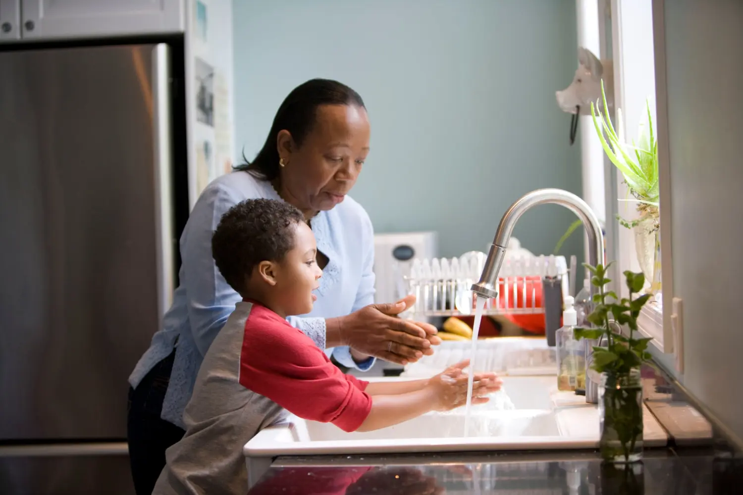 Grandmother and grandson at home