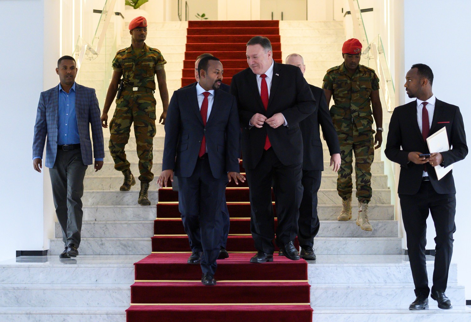 U.S. Secretary of State Mike Pompeo walks with Ethiopian Prime Minister Abiy Ahmed at the Prime Minister office after a meeting in Addis Ababa, Ethiopia February 18, 2020. Andrew Caballero-Reynolds/Pool via REUTERS
