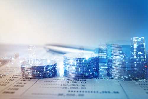 Double exposure of city and rows of coins for finance and banking concept