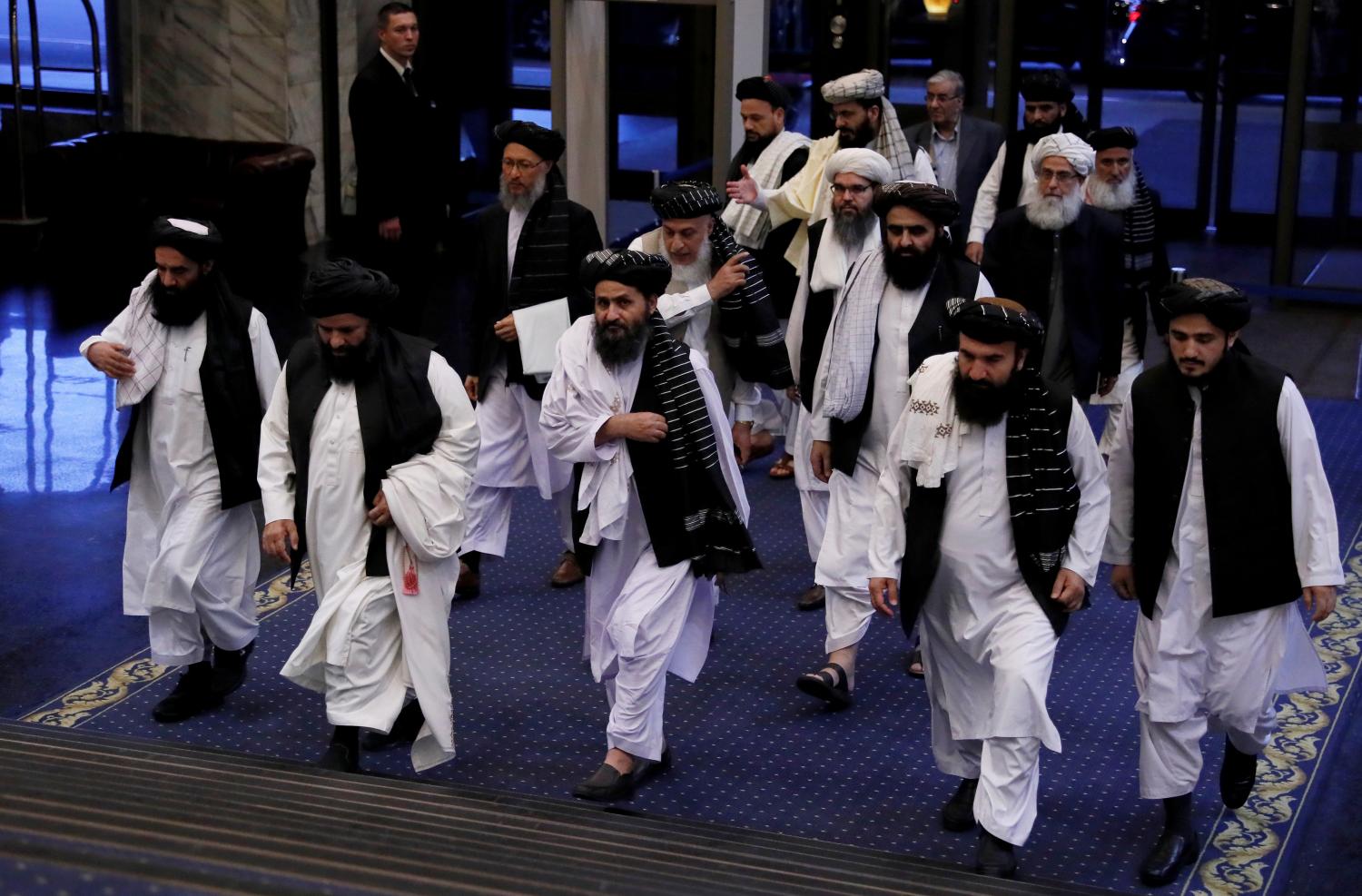 Taliban officials led by the movement's chief negotiator Mullah Abdul Ghani Baradar (C, front) attend peace talks between senior Afghan politicians and Taliban negotiators in Moscow, Russia May 29, 2019. REUTERS/Evgenia Novozhenina