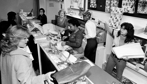 Workers at Cain-Sloan Co downtown store wrapping Christmas gifts for holiday shoppers Dec 13, 1979