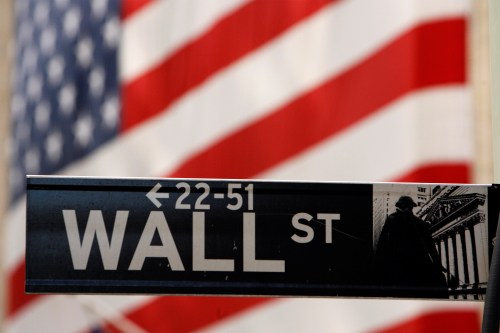 FILE PHOTO: A Wall Street sign is seen outside of the New York Stock Exchange September 19, 2008.  REUTERS/Lucas Jackson/File Photo